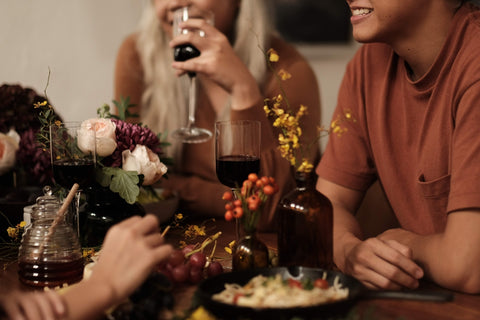 Friends toasting with red wine