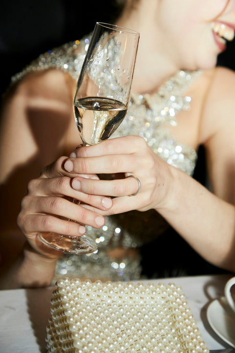 Celebrating with a glass of sparkling wine