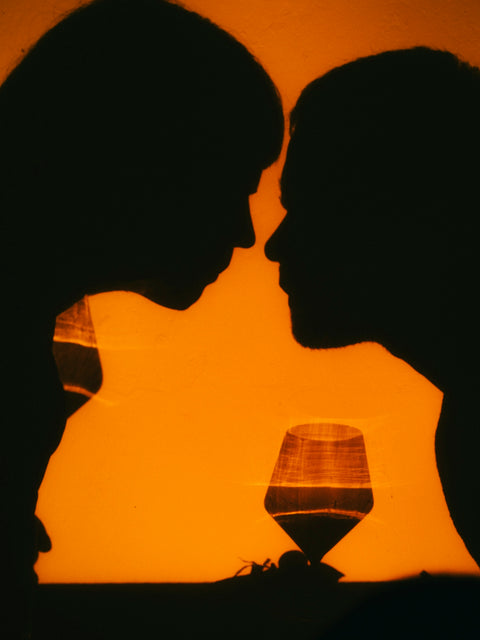 Friends sharing a bold red wine