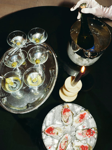 Champagne coupes and oysters