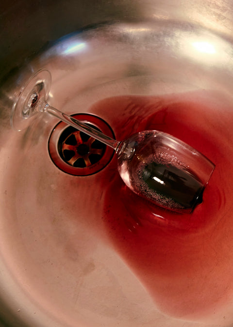 Red wine swirling in a glass — wines like Josh, from Cambridge Wines