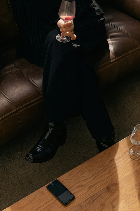 A glass of bold red wine